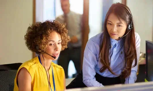 Two Women Working in an Office
