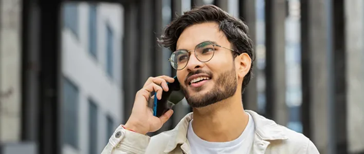 man_with_glasses_on_phone